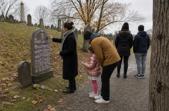 The Real Reason Why 'I Voted' Stickers Pile Up on a Gravestone Every Election Day - Rochester - 1